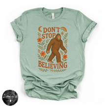 Load image into Gallery viewer, Don't Stop Believing Bigfoot Tee | Cryptid Graphic T-Shirt