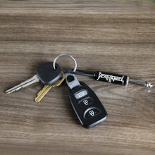 Load image into Gallery viewer, Death Angel Logo Guitar Plug Keychain