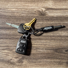 Load image into Gallery viewer, Anthrax Logo Guitar Plug Keychain