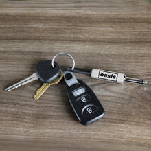 Load image into Gallery viewer, Oasis Logo Guitar Plug Keychain